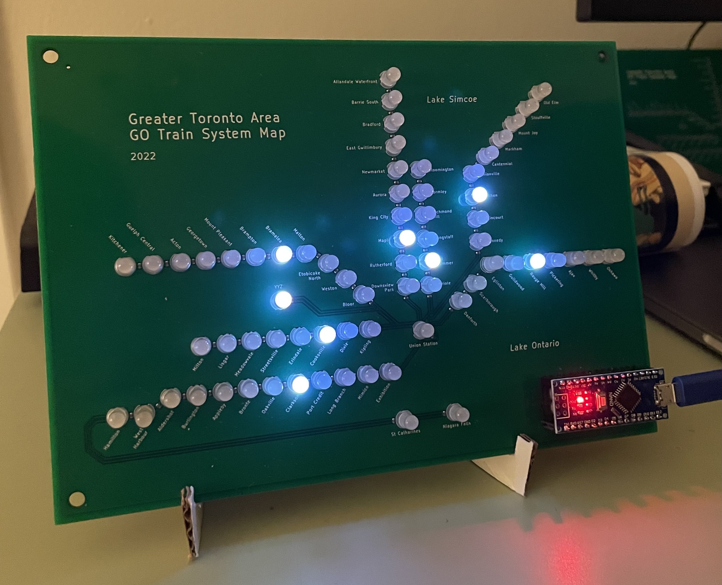 circuit board of toronto train system with LEDs for each station lighting up